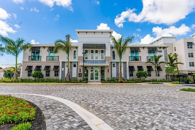 a view of a building with a garden
