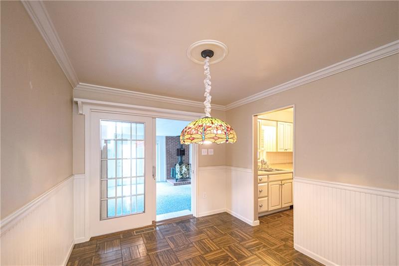 58 Bellview Circle McKees Rocks, PA 15136 - Photo 4 of 25 Dining room off kitchen with exit to family room addition.