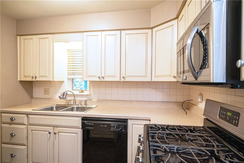 58 Bellview Circle McKees Rocks, PA 15136 - Photo 5 of 25 Updated white kitchen. Appliances like new.