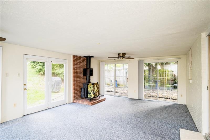 58 Bellview Circle McKees Rocks, PA 15136 - Photo 7 of 25 Bright and cheery 23x15 Family Room addition. Fireplace with blower for heat.