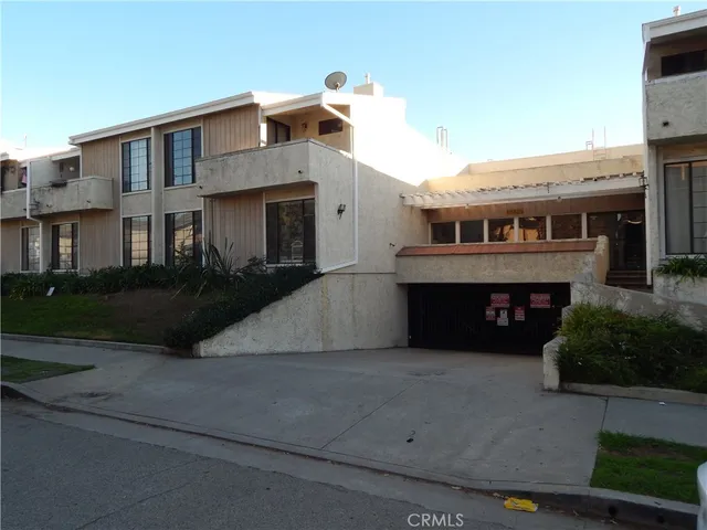 a front view of a house with yard