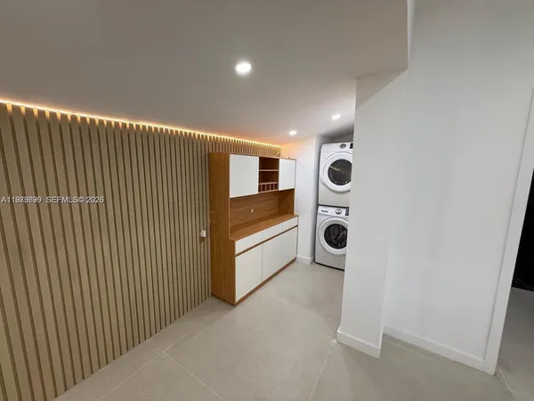a view of kitchen and utility room