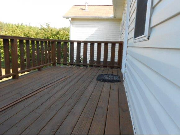 639 Wendy Graham, NC 27253 - Photo 19 of 21 a balcony with wooden floor