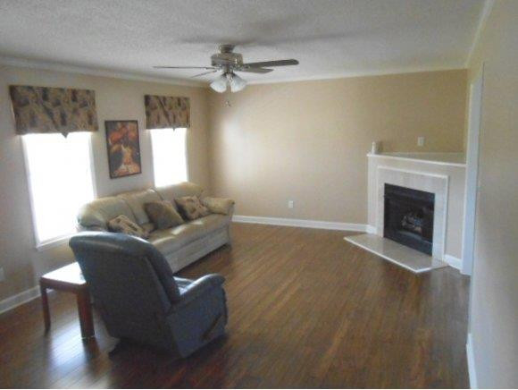 639 Wendy Graham, NC 27253 - Photo 4 of 21 a living room with furniture and a fireplace