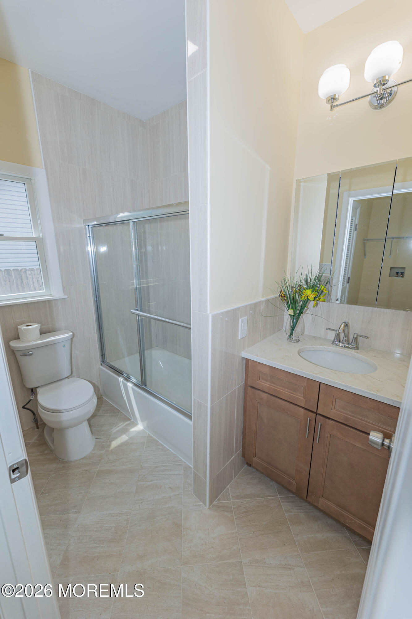 2408 Herbertsville Road Point Pleasant, NJ 08742 - Photo 57 of 82 a bathroom with a sink and mirror