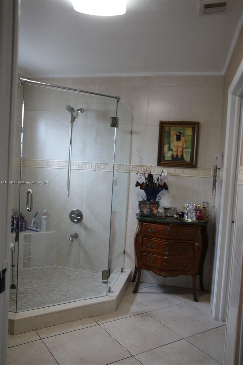 11861 Southwest 92nd Lane Miami, FL 33186 - Photo 27 of 33 a bathroom with a shower