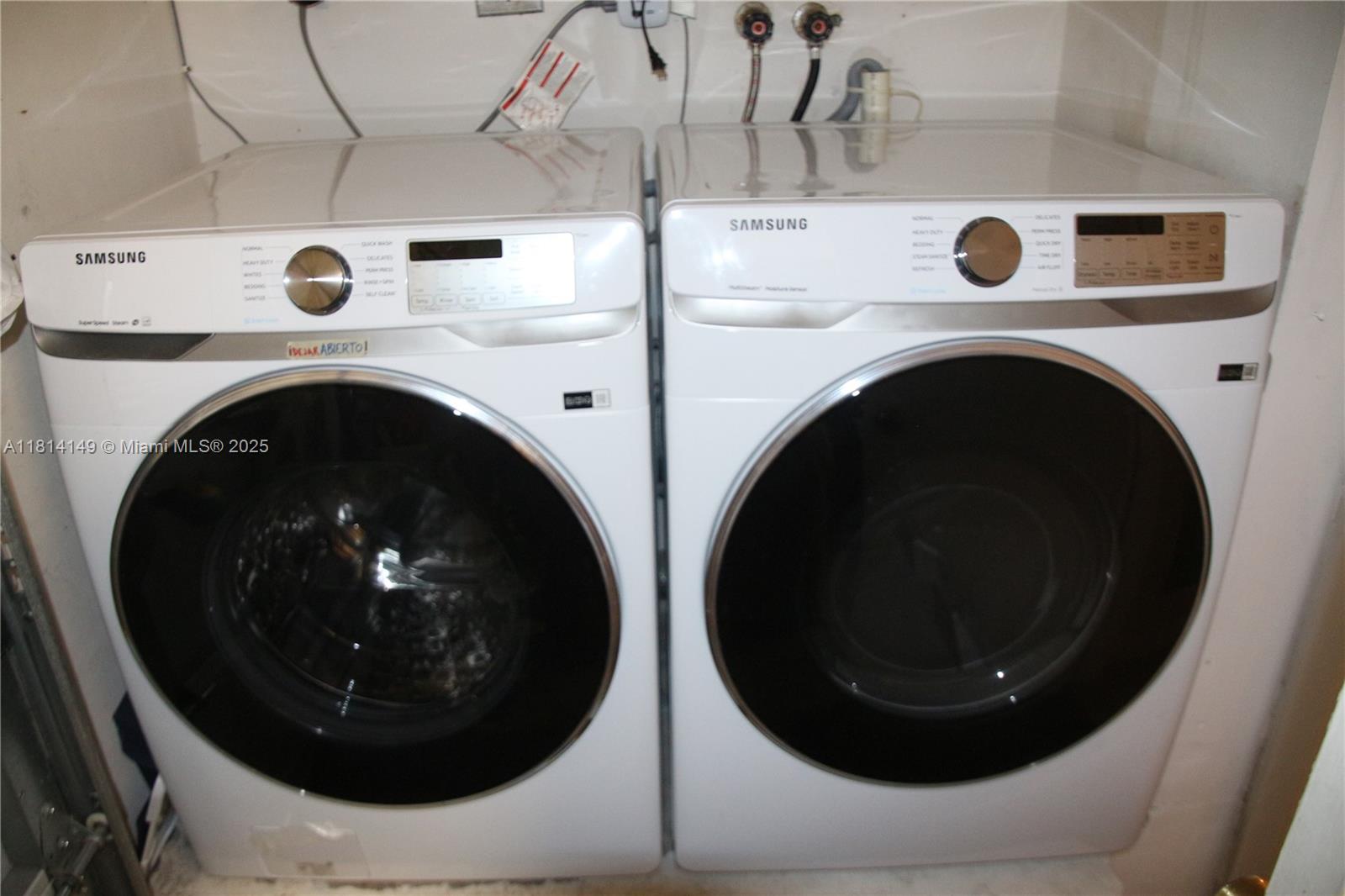 11861 Southwest 92nd Lane Miami, FL 33186 - Photo 28 of 33 a close up view of washer and dryer