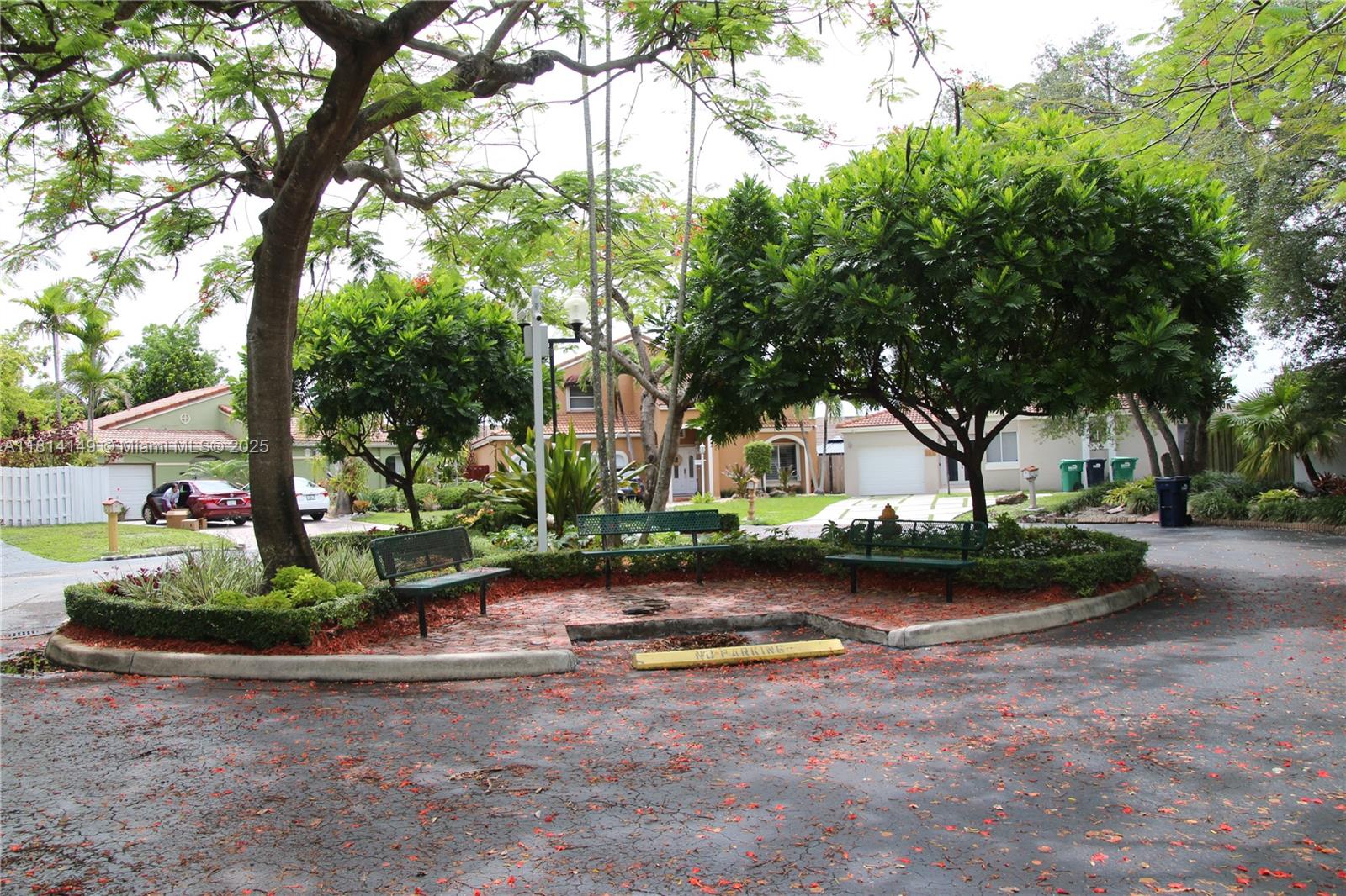 11861 Southwest 92nd Lane Miami, FL 33186 - Photo 30 of 33 a view of a garden with plants and large trees