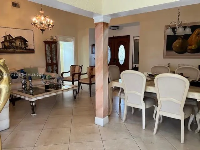 a view of a dining room with furniture