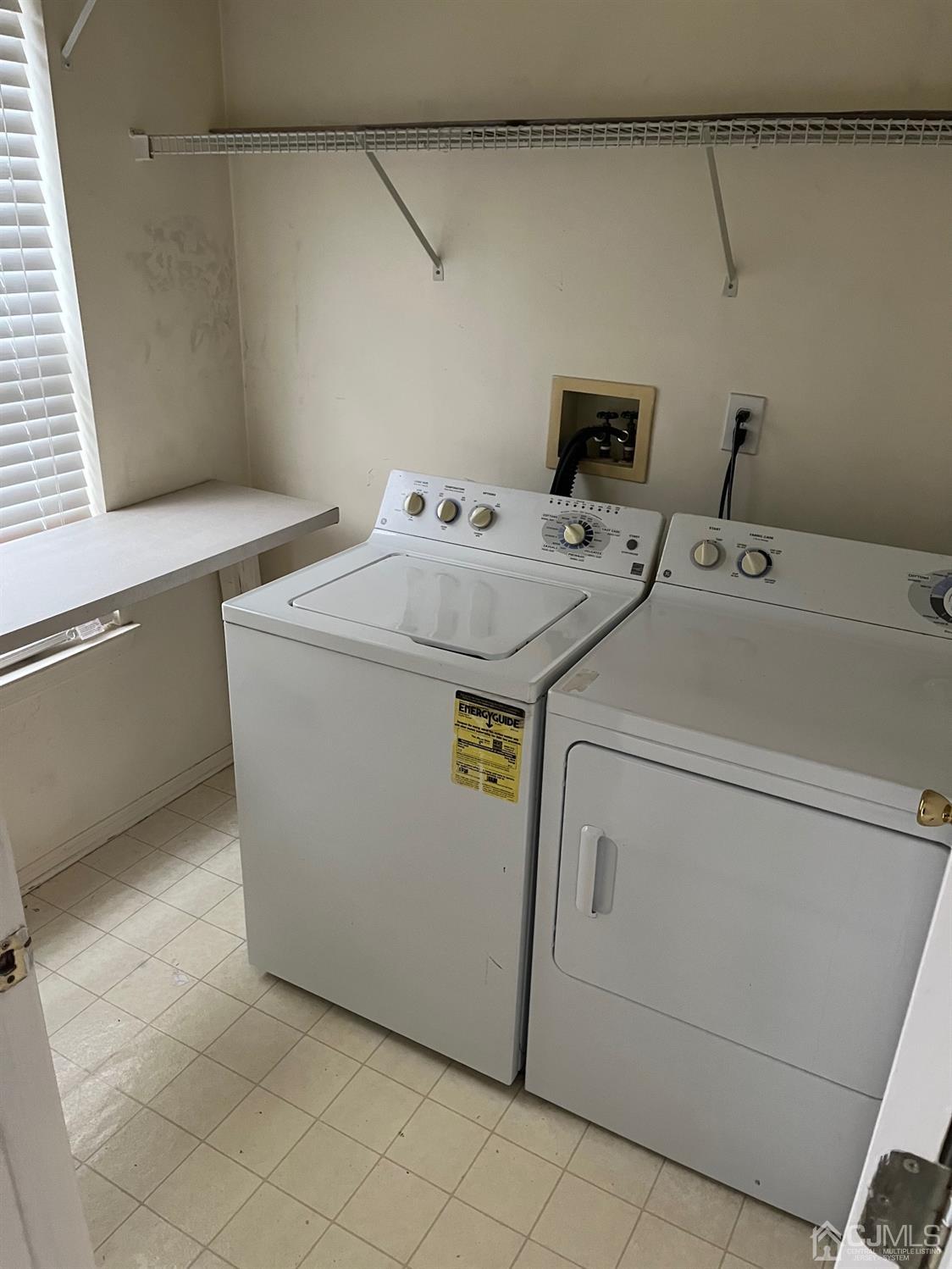 1711 Ridgeview Court Sayreville, NJ 08859 - Photo 5 of 18 a utility room with dryer and washer