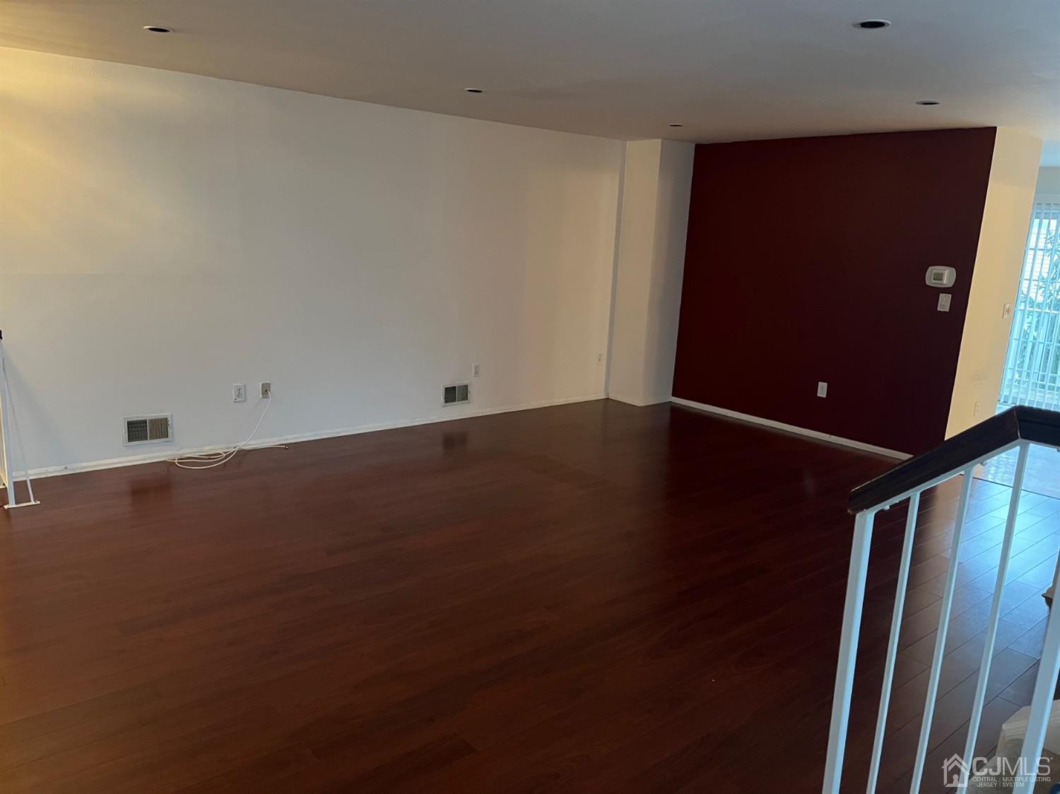 1711 Ridgeview Court Sayreville, NJ 08859 - Photo 9 of 18 an empty room with wooden floor