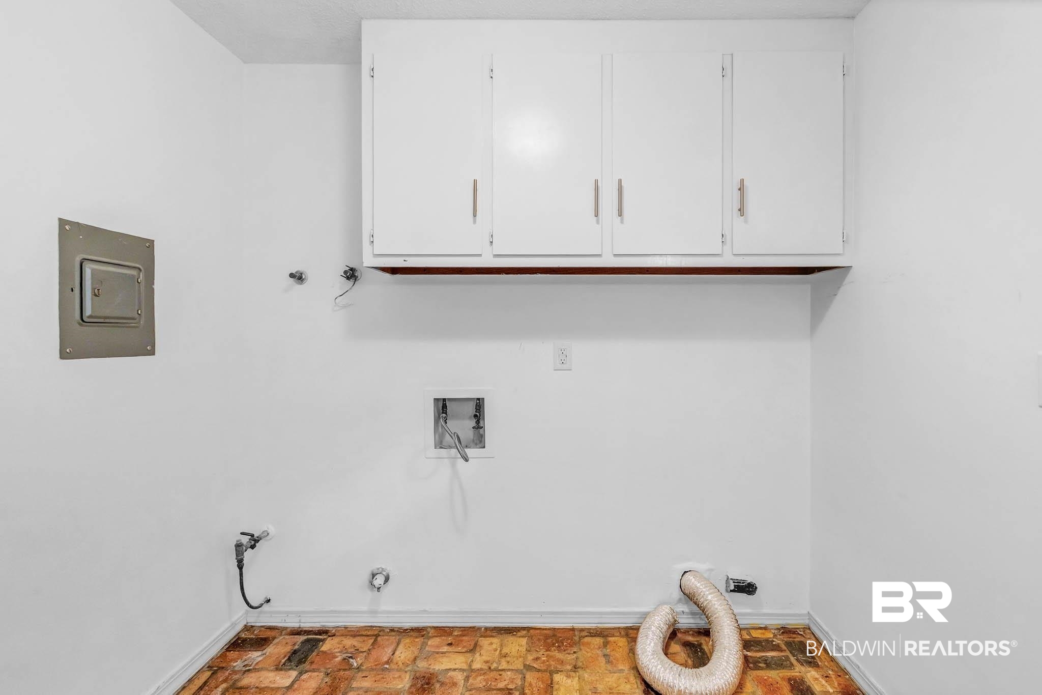 309 West Brandy Run Road Mobile, AL 36608 - Photo 60 of 100 Washroom featuring washer hookup, gas dryer hookup, electric panel, brick flooring, and cabinet space