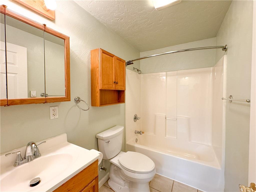 160 Francis Mine State Road Burgettstown, PA 15021 - Photo 12 of 12 a bathroom with a sink a toilet and shower