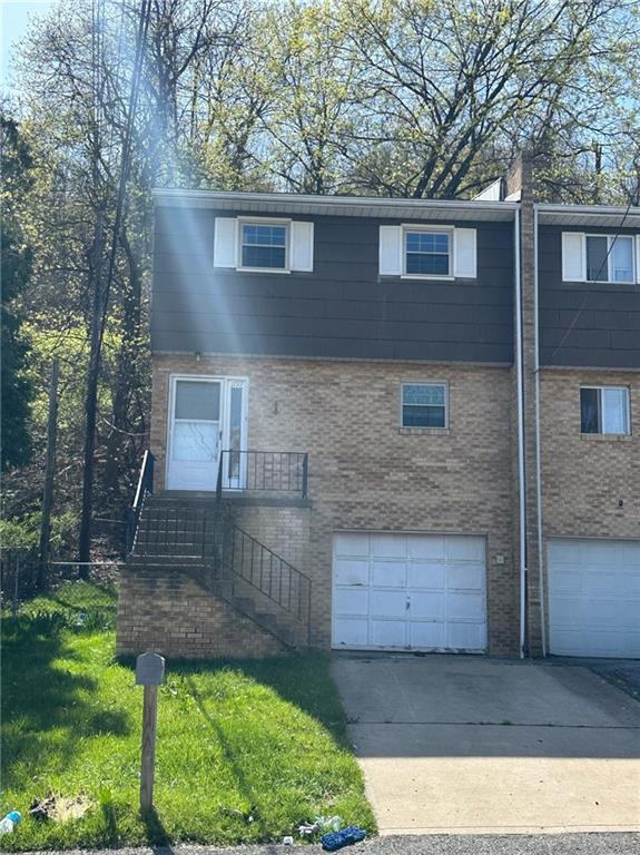 1197 Pine Hollow Road McKees Rocks, PA 15136 - Photo 3 of 22 a front view of a house with garden