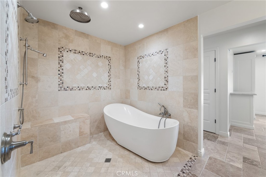 72408 Desert Drive Rancho Mirage, CA 92270 - Photo 19 of 42 Rain shower and stand alone tub in primary bathroom