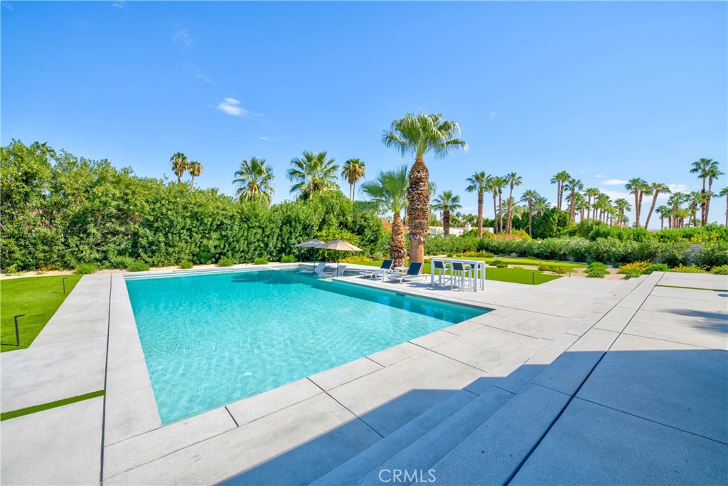 72408 Desert Drive Rancho Mirage, CA 92270 - Photo 25 of 42 Pool and baja shelf with umbrellas