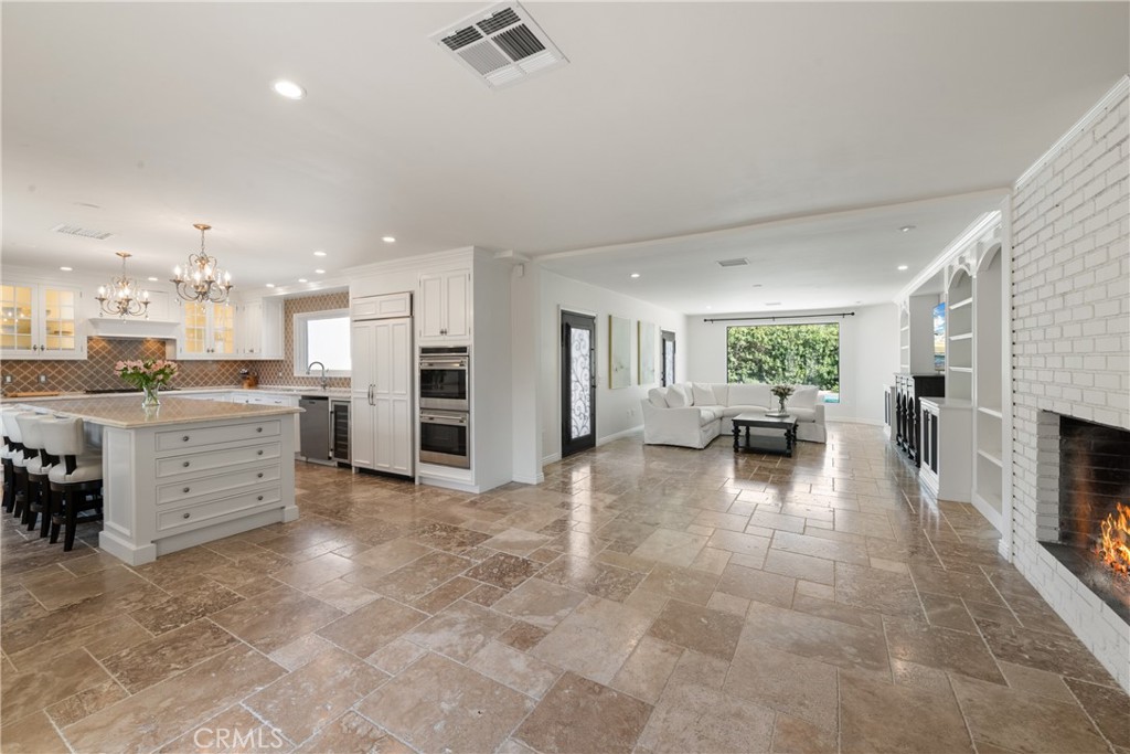 72408 Desert Drive Rancho Mirage, CA 92270 - Photo 9 of 42 Open concept kitchen and livingroom