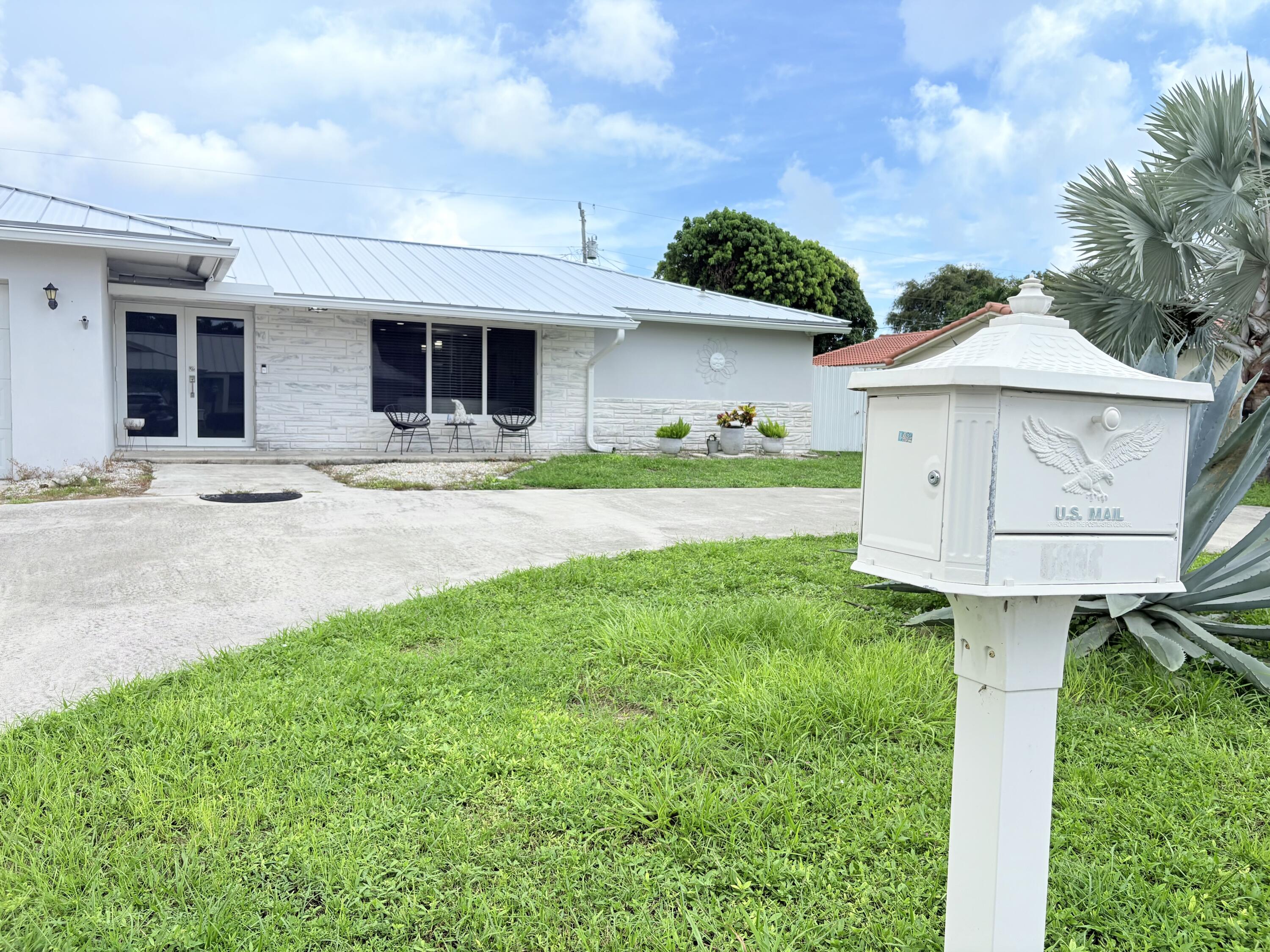 1861 Caribbean Road West Lake Clarke Shores, FL 33406 - Photo 20 of 73 22