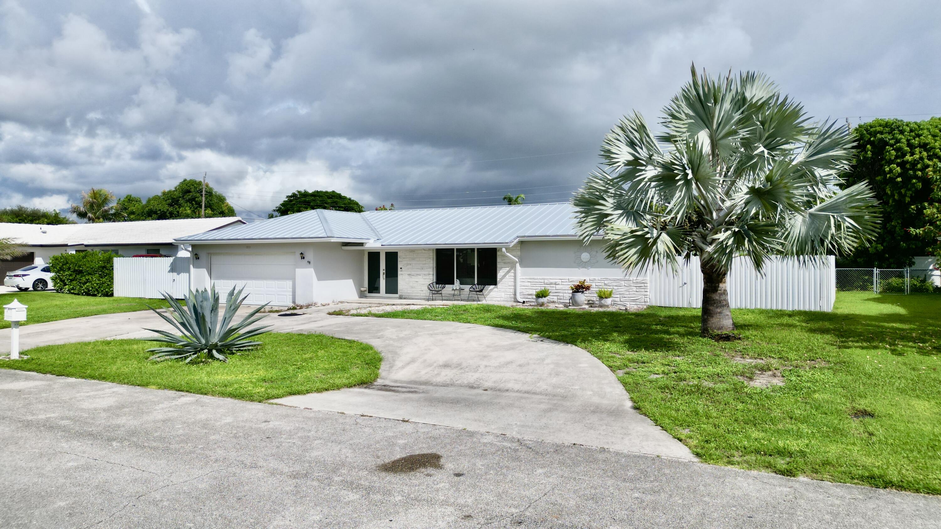 1861 Caribbean Road West Lake Clarke Shores, FL 33406 - Photo 5 of 73 6