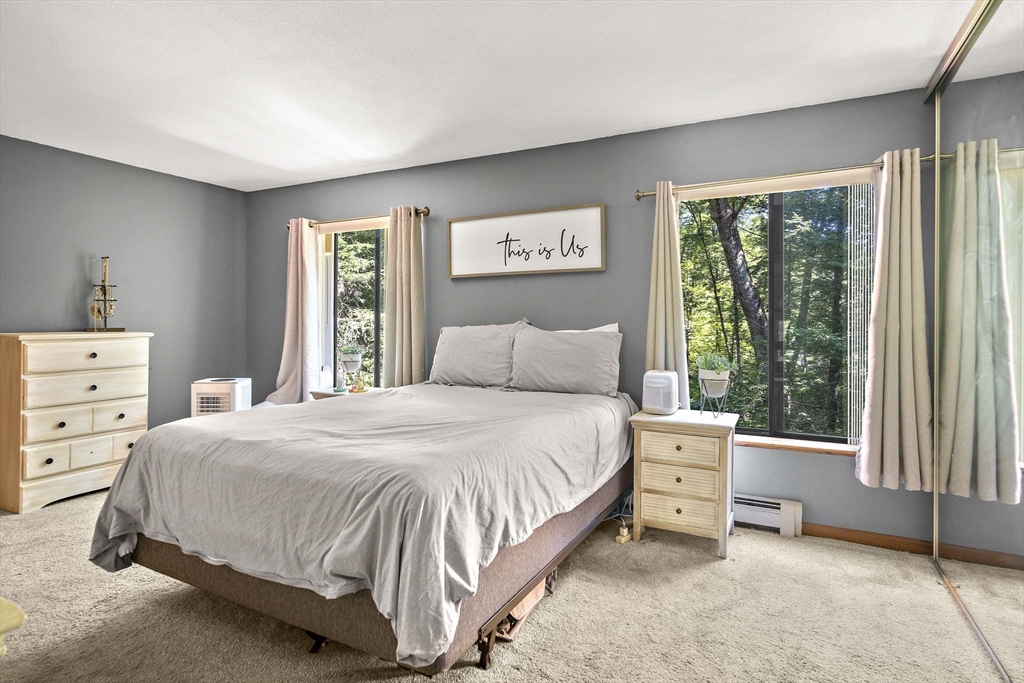30 Harper Ridge Road Hampstead, NH 03826 - Photo 23 of 41 a bedroom with a bed and a window
