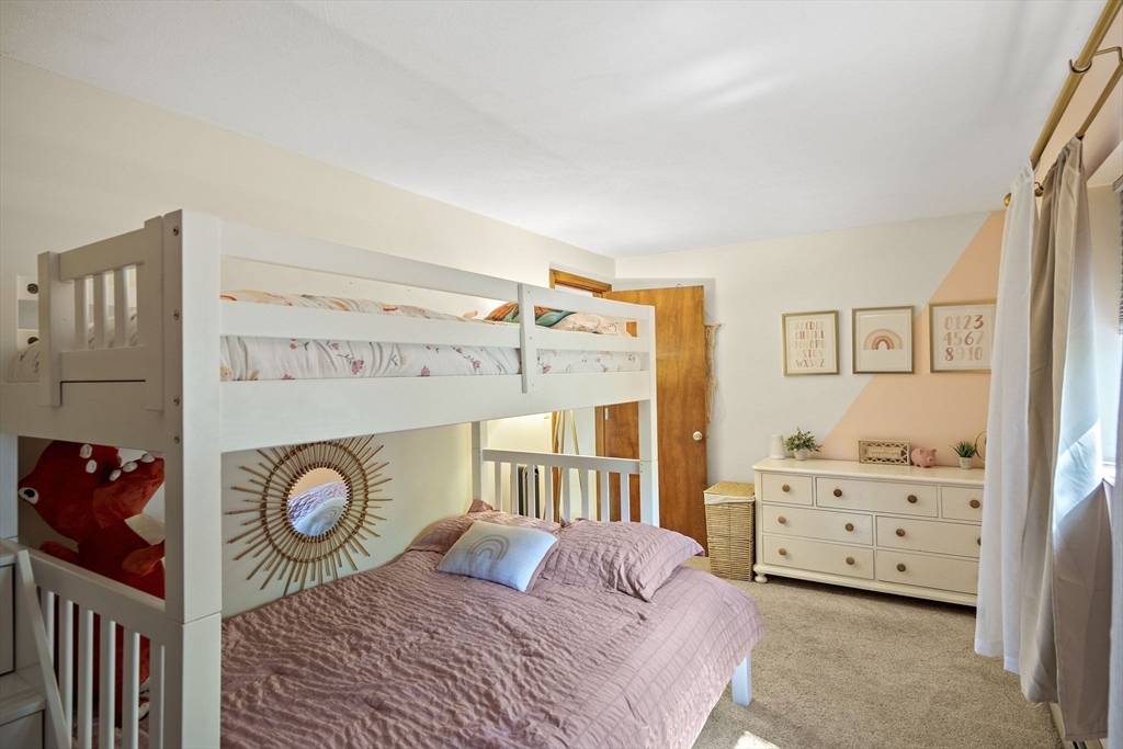 30 Harper Ridge Road Hampstead, NH 03826 - Photo 27 of 41 a bedroom with a bed and a window