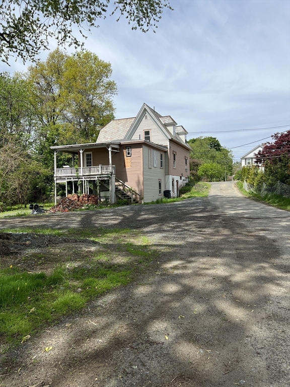 351 Bridge Street Northampton, MA 01060 - Photo 8 of 29 a view of a house with a big yard