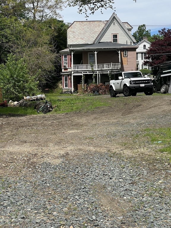 351 Bridge Street Northampton, MA 01060 - Photo 9 of 29 a view of a car park in front of house
