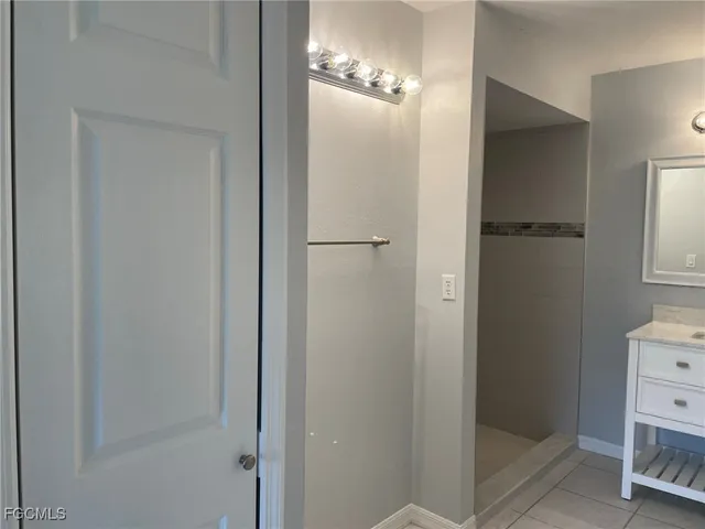 a bathroom with a mirror