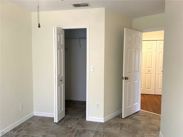 a view of an empty room with window