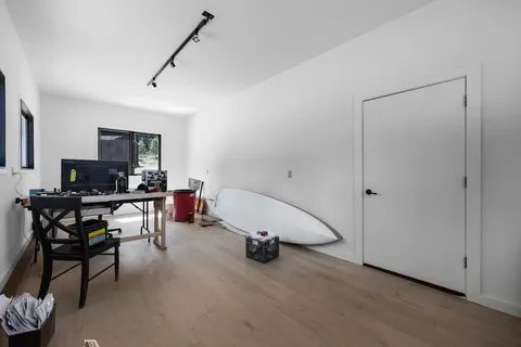 a view of a workspace with furniture