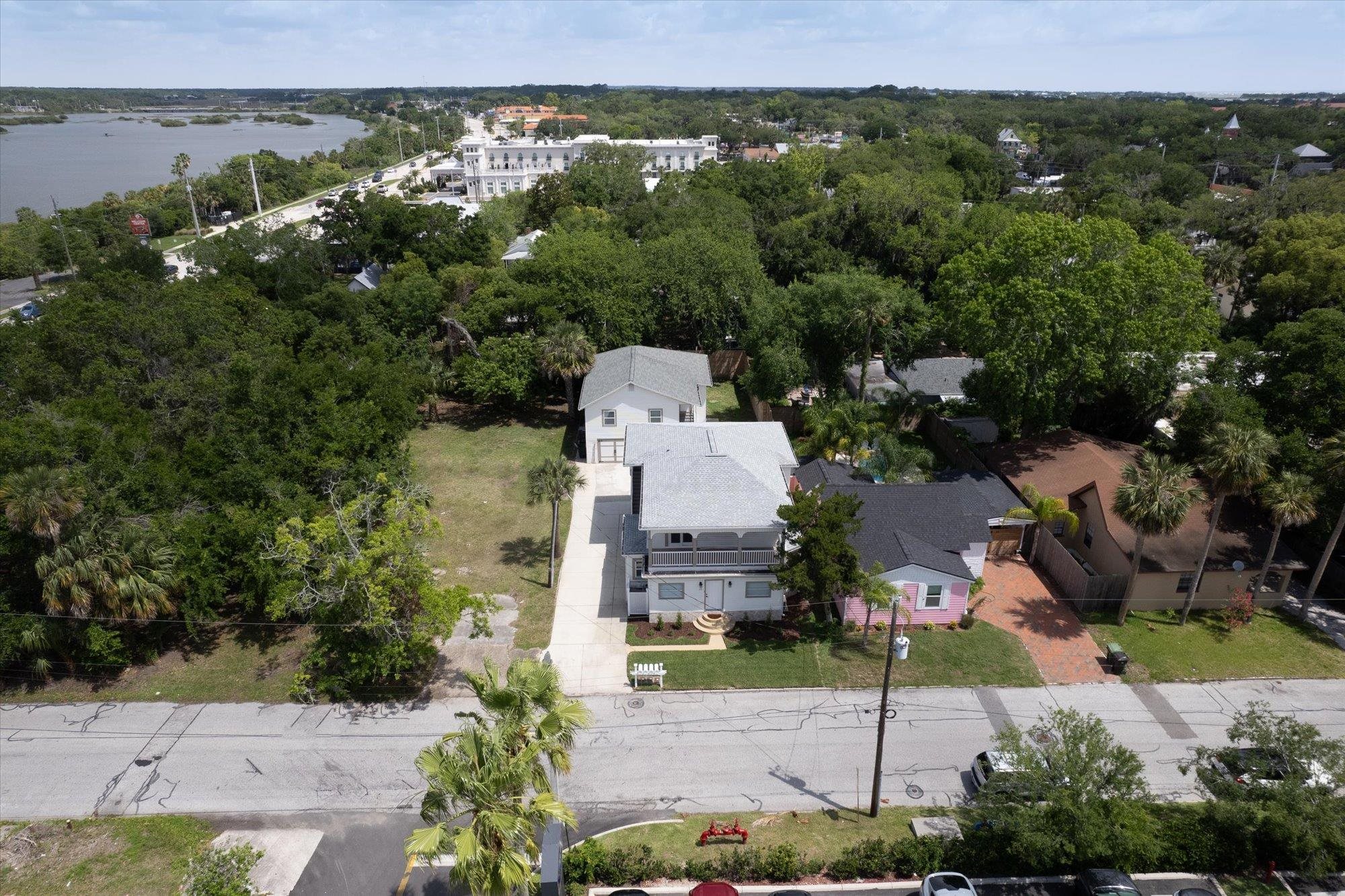 28 Sebastian Avenue St. Augustine, FL 32084 - Photo 23 of 24 an aerial view of a house with a yard and lake view
