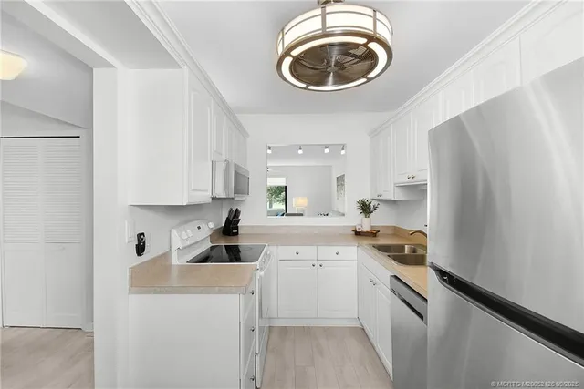 $254,000 | 5423 Southeast Miles Grant Road, Unit 201, Stuart, FL 34997