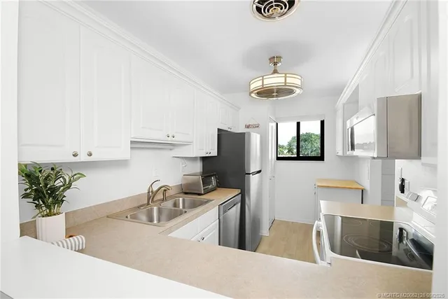 $254,000 | 5423 Southeast Miles Grant Road, Unit 201, Stuart, FL 34997