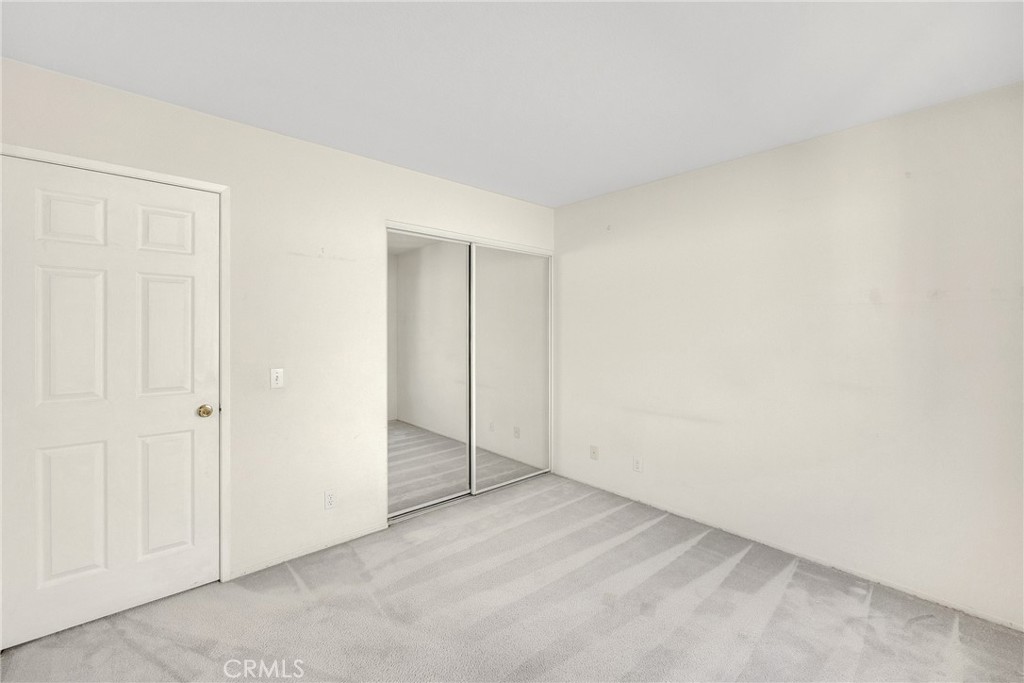 738 Orchard Loop Azusa, CA 91702 - Photo 29 of 50 an empty room with sliding door