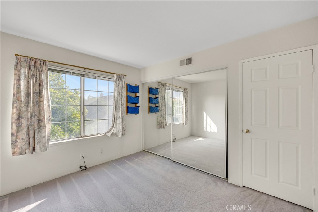738 Orchard Loop Azusa, CA 91702 - Photo 33 of 50 a view of an empty room with a window