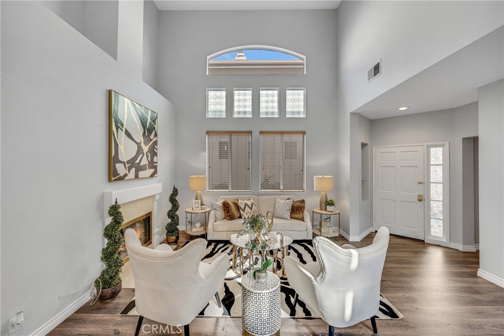 738 Orchard Loop Azusa, CA 91702 - Photo 9 of 50 a view of a dining room with furniture window and wooden floor