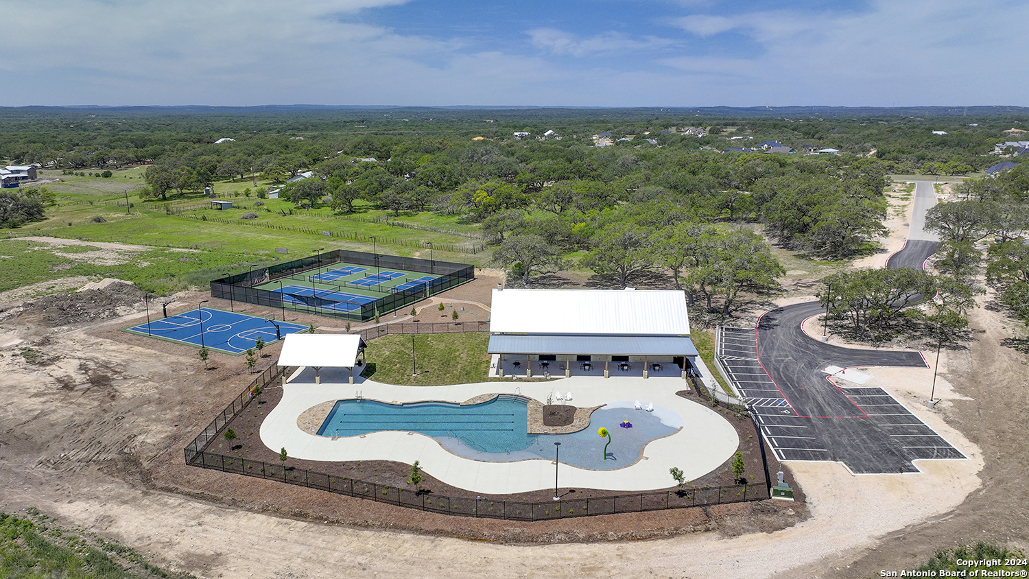 34744 Ansley Rdg Trail Bulverde, TX 78163 - Photo 26 of 39 a view of a swimming pool with an outdoor seating