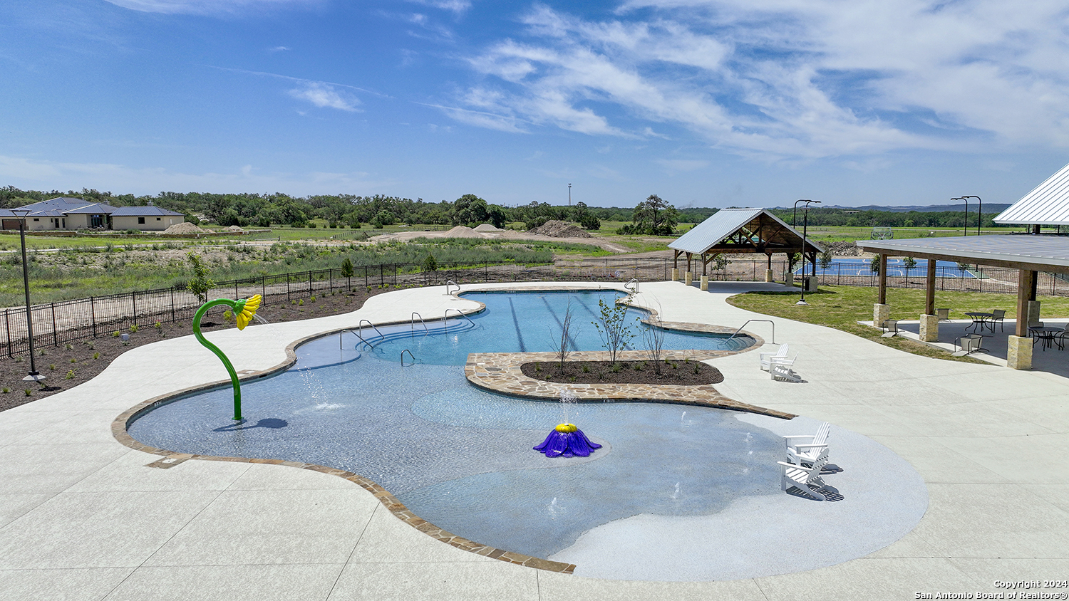 34744 Ansley Rdg Trail Bulverde, TX 78163 - Photo 31 of 39 a swimming pool with outdoor seating and green space