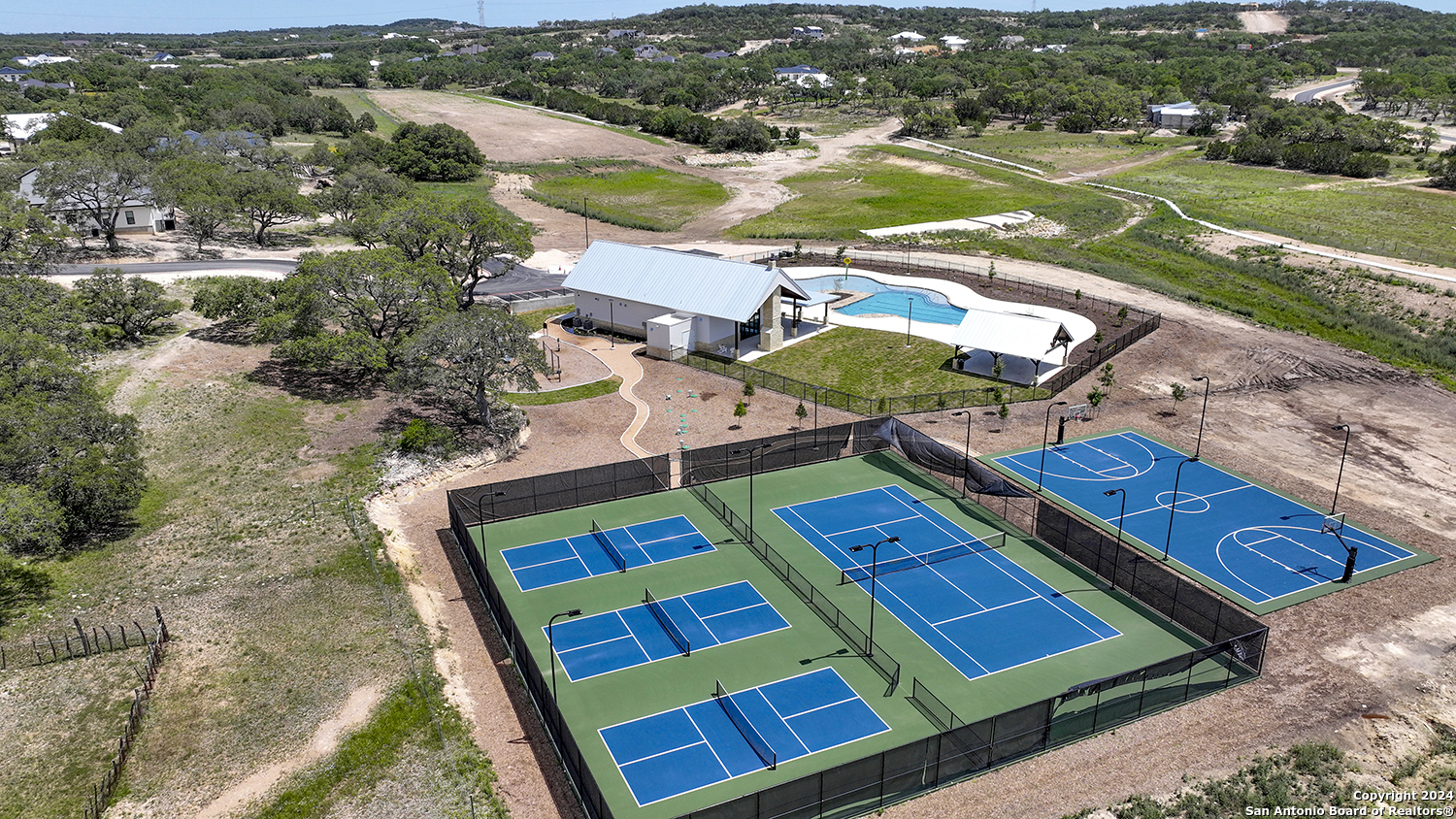 34744 Ansley Rdg Trail Bulverde, TX 78163 - Photo 33 of 39 an aerial view of a pool yard and mountain view in back