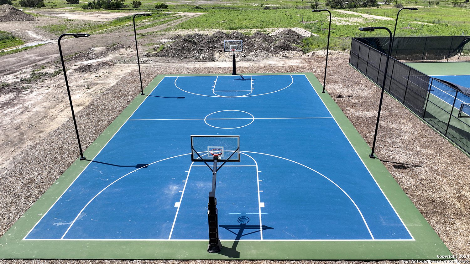 34744 Ansley Rdg Trail Bulverde, TX 78163 - Photo 37 of 39 a view of swimming pool with a chairs