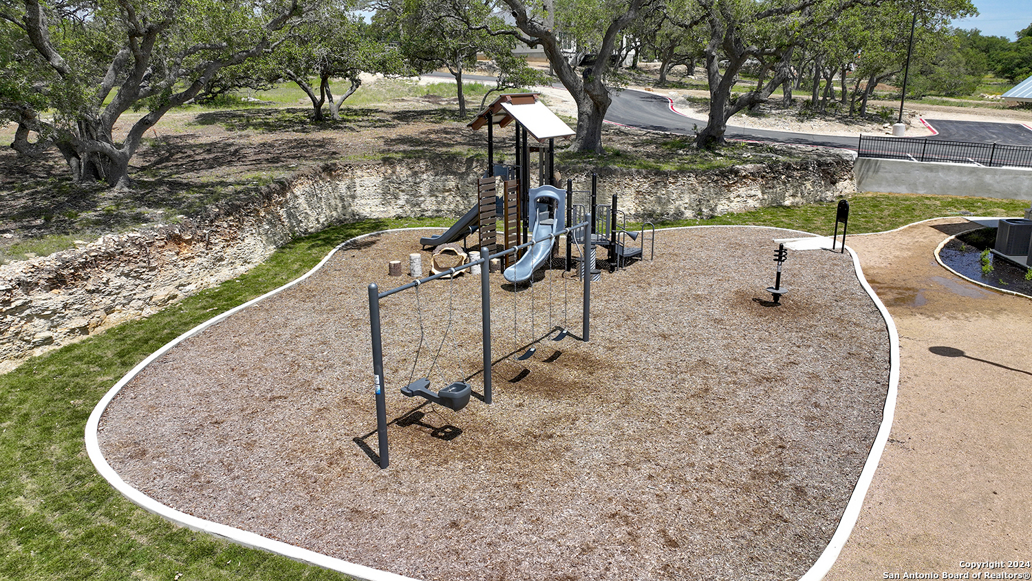 34744 Ansley Rdg Trail Bulverde, TX 78163 - Photo 39 of 39 swimming pool view with a garden space