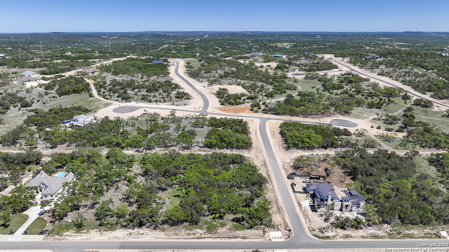 34744 Ansley Rdg Trail Bulverde, TX 78163 - Photo 5 of 39 an aerial view of residential houses with outdoor space and trees