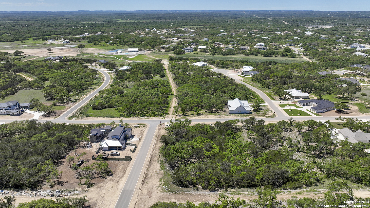 34744 Ansley Rdg Trail Bulverde, TX 78163 - Photo 6 of 39 an aerial view of residential houses with outdoor space and trees