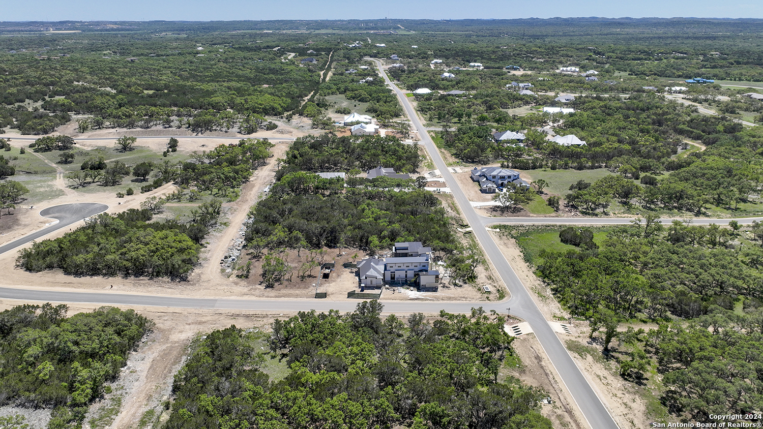 34744 Ansley Rdg Trail Bulverde, TX 78163 - Photo 7 of 39 an aerial view of residential houses with outdoor space and trees