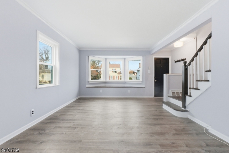 43 Freeman Street Woodbridge, NJ 07095 - Photo 7 of 24 a view of an empty room with a window