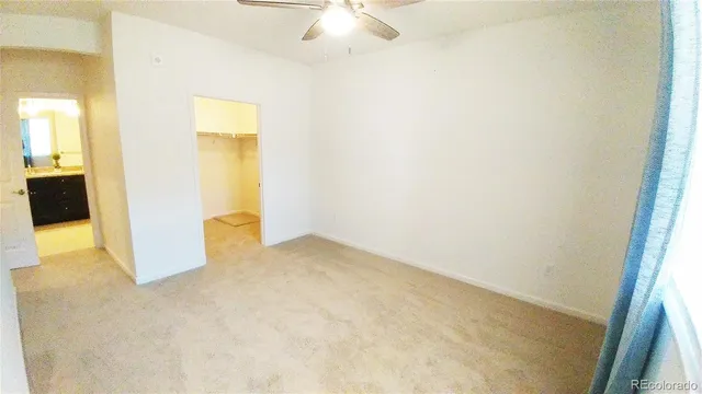 an empty room with a bathroom