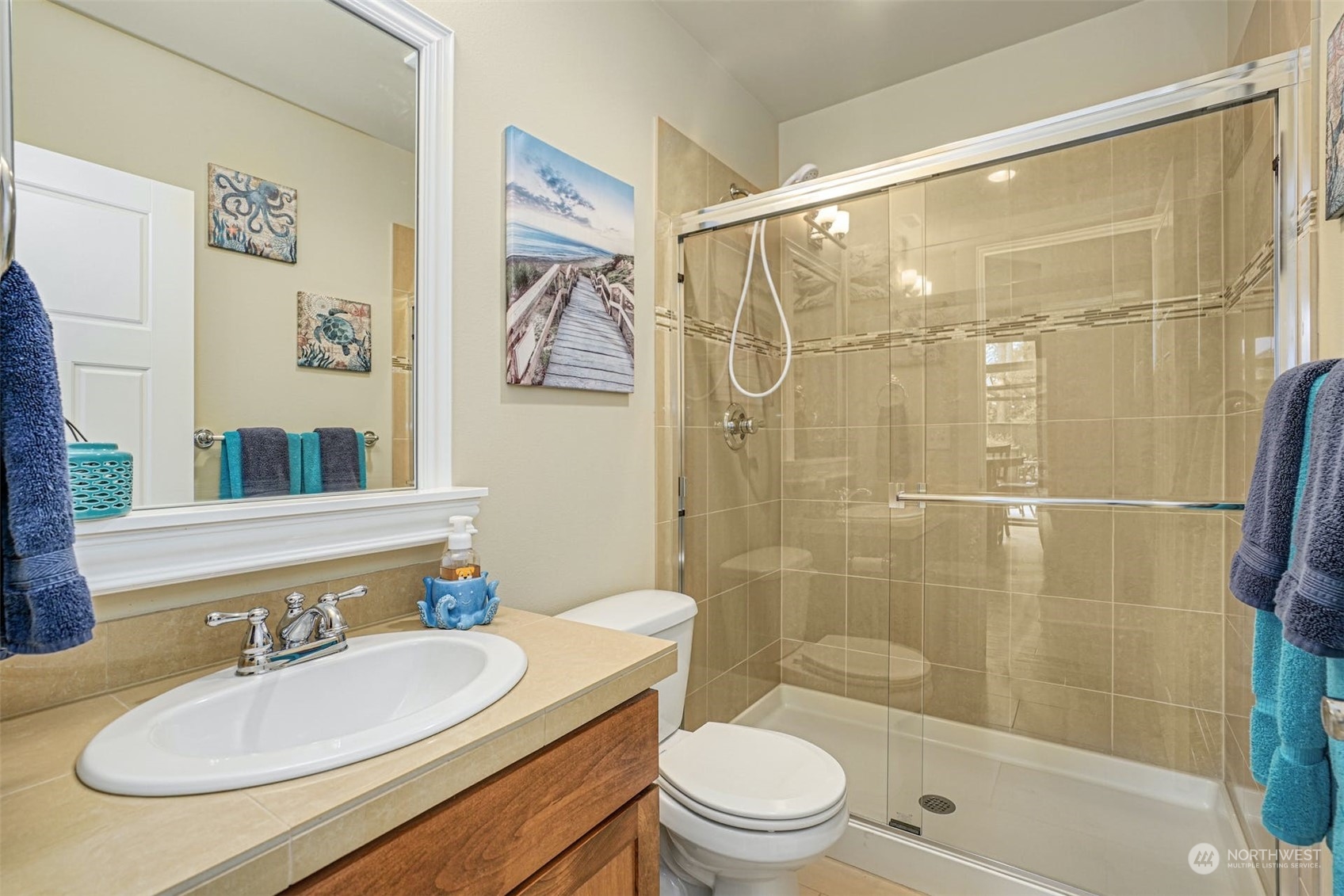 4029 180th Place Southeast Bothell, WA 98012 - Photo 14 of 33 a bathroom with a sink a toilet and shower