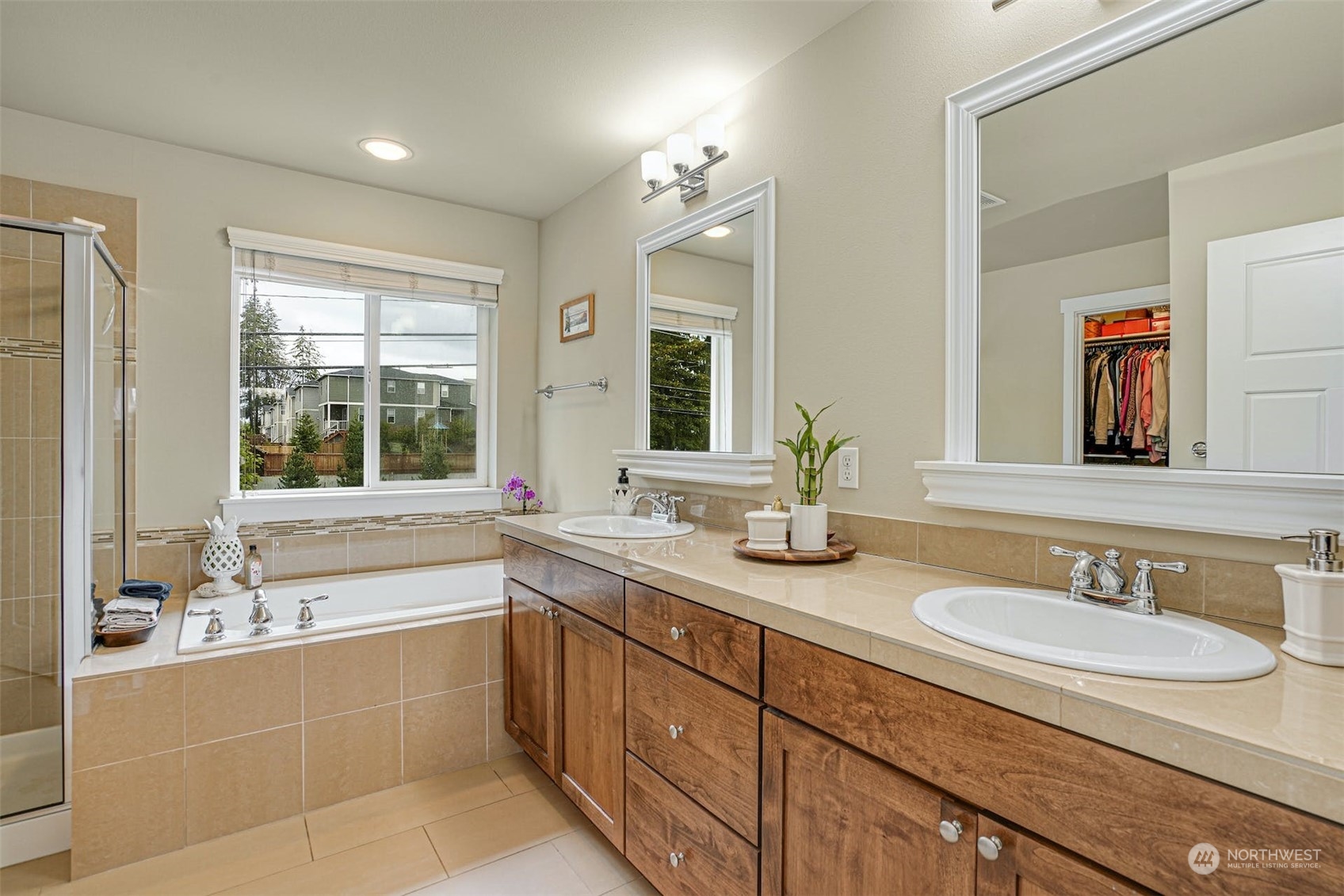 4029 180th Place Southeast Bothell, WA 98012 - Photo 21 of 33 a bathroom with a granite countertop sink and a bathtub