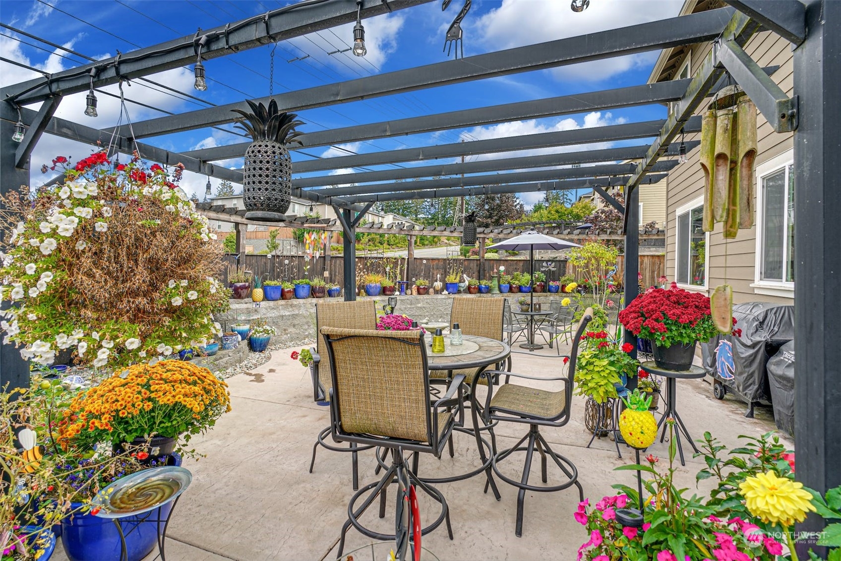 4029 180th Place Southeast Bothell, WA 98012 - Photo 29 of 33 a dining area with furniture and a chandelier