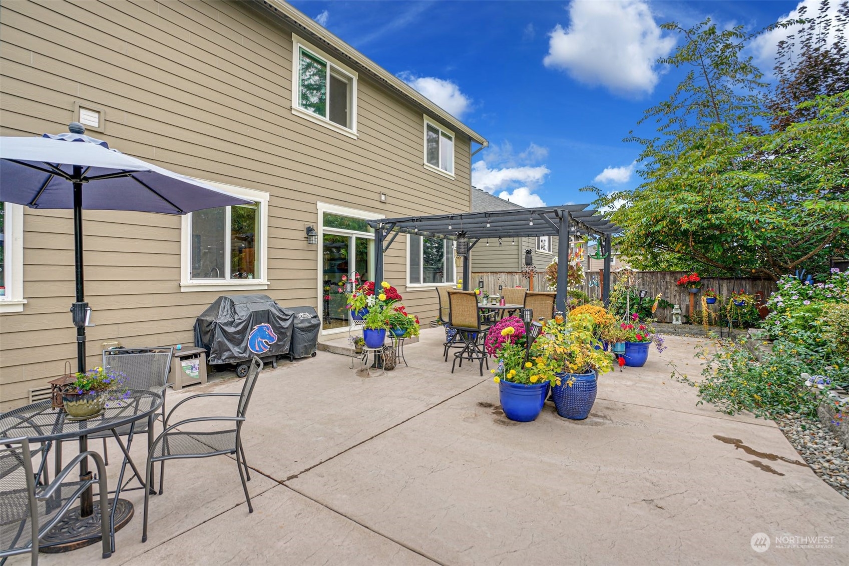 4029 180th Place Southeast Bothell, WA 98012 - Photo 32 of 33 a view of a chairs and table in a patio